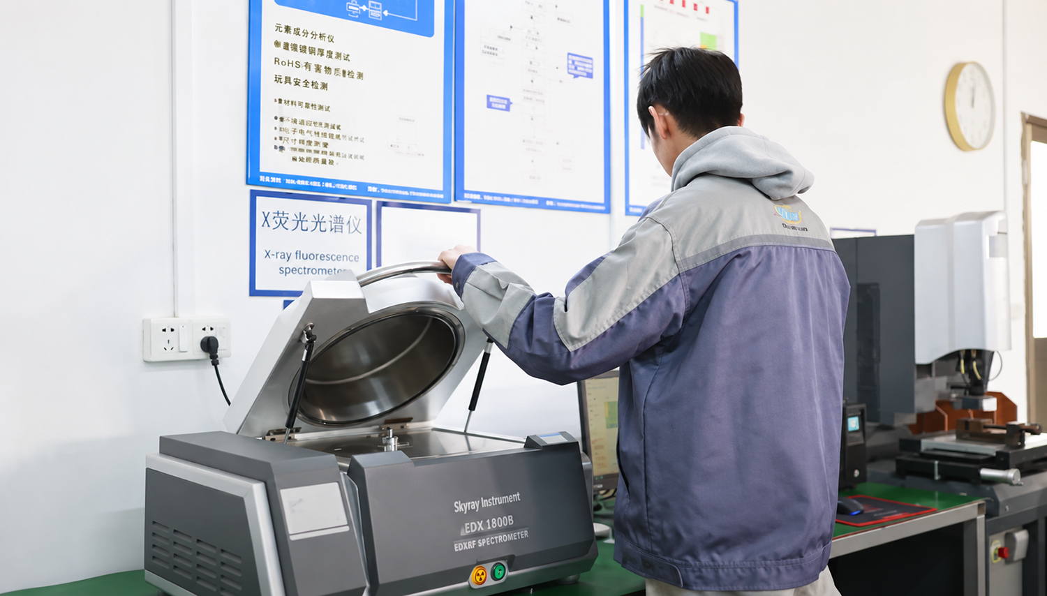 YILIN technician using an X-ray fluorescence spectrometer for material testing